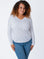 Micah is 5'9, size 10 and wears a size L # Women's White Long Sleeves | Fresh Clean Threads